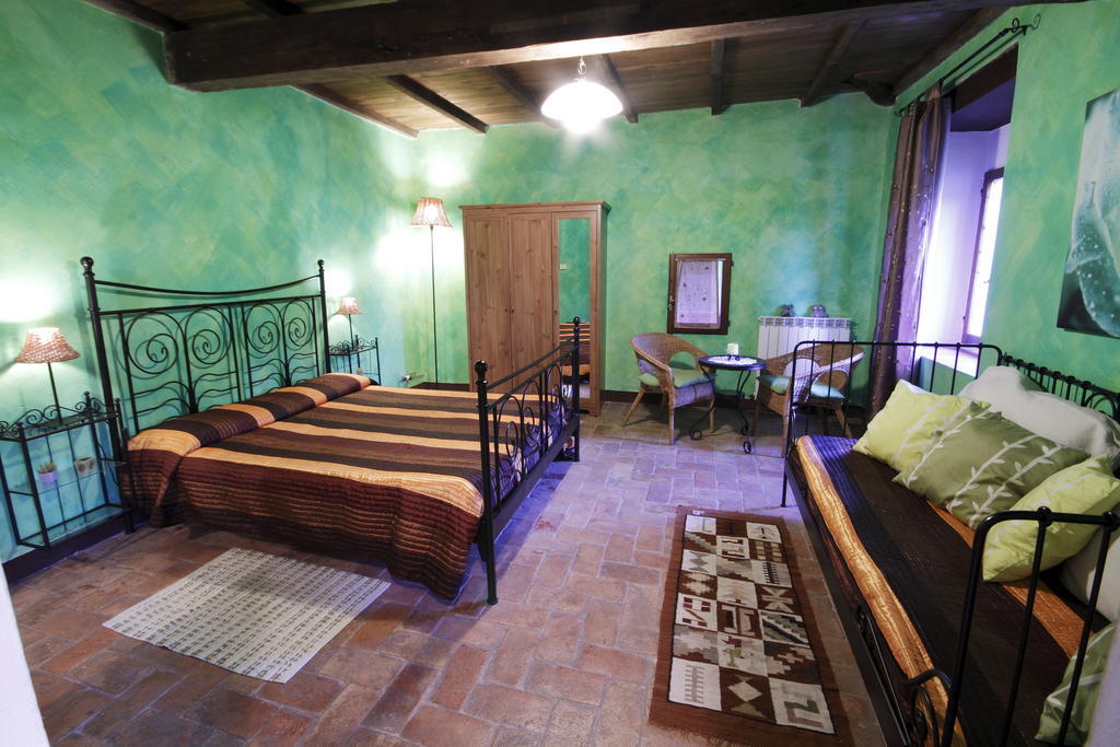 زوكّا Antica Locanda La Canonica الغرفة الصورة